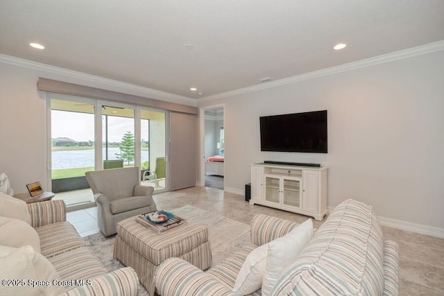 living room featuring ornamental molding and a water view