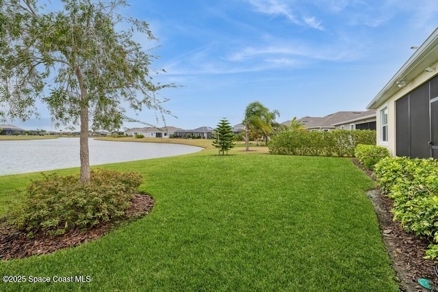 view of yard featuring a water view