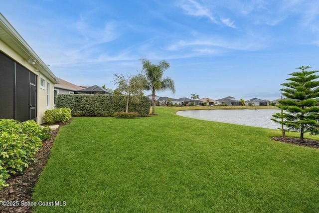 view of yard featuring a water view