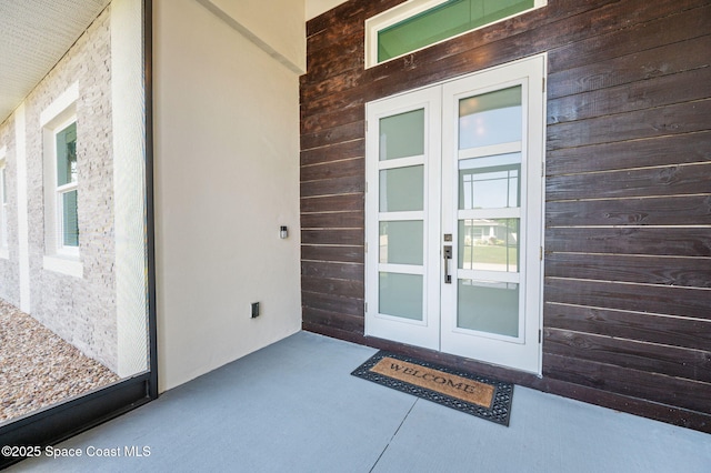 doorway to property with french doors