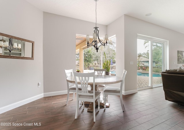 dining room featuring a notable chandelier