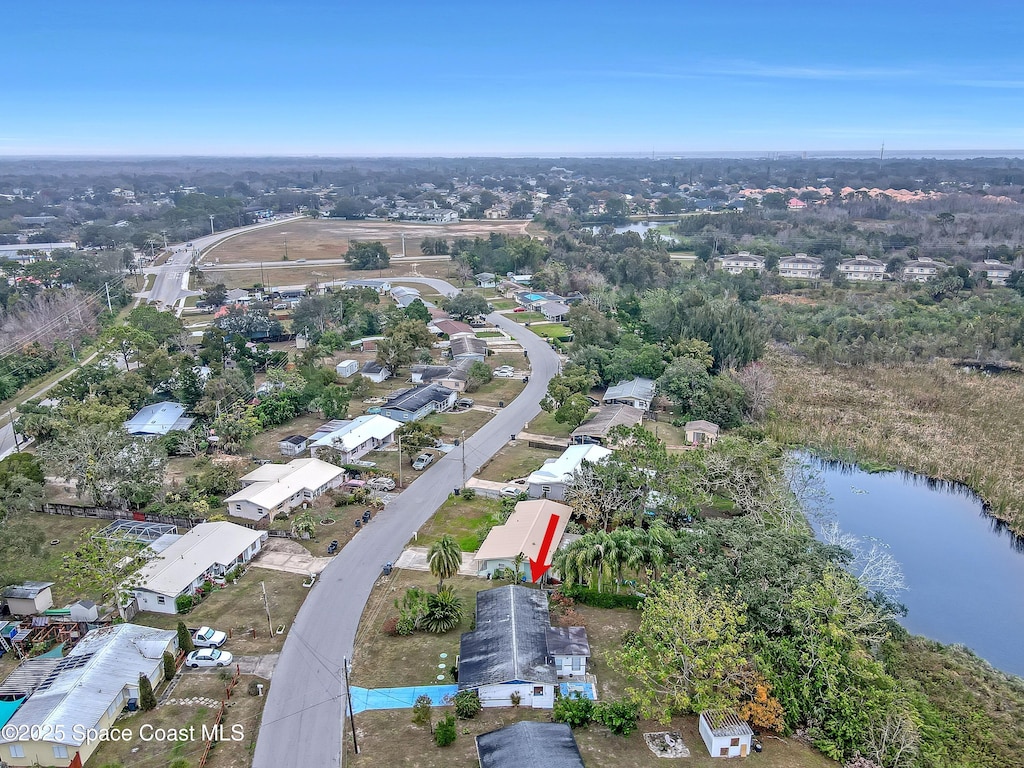 bird's eye view with a water view