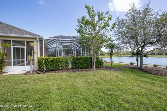 3489 Ahern Pl, Melbourne, FL 32940 - view of yard with glass enclosure and a water view