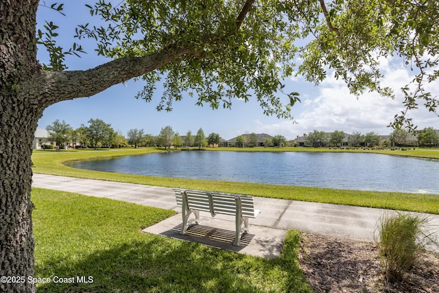 3489 Ahern Pl, Melbourne, FL 32940 - view of home's community with a water view and a lawn