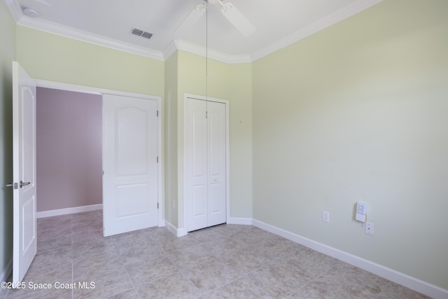 3489 Ahern Pl, Melbourne, FL 32940 - unfurnished bedroom with baseboards, visible vents, a closet, and ornamental molding
