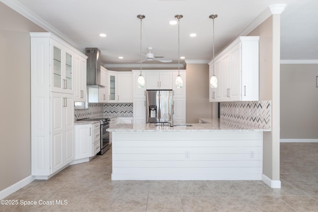 3489 Ahern Pl, Melbourne, FL 32940 - kitchen with stainless steel appliances, a peninsula, wall chimney exhaust hood, and crown molding