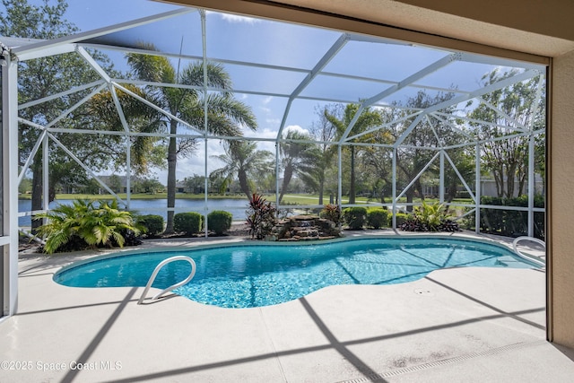 3489 Ahern Pl, Melbourne, FL 32940 - outdoor pool featuring a patio area, glass enclosure, and a water view