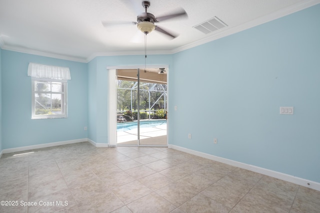 3489 Ahern Pl, Melbourne, FL 32940 - spare room with crown molding, ceiling fan, visible vents, light tile patterned flooring, and baseboards