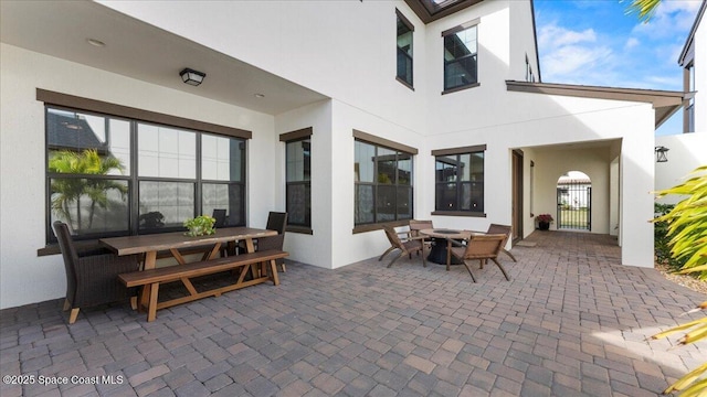 view of patio featuring outdoor dining area