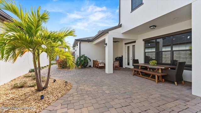 view of patio / terrace featuring ceiling fan