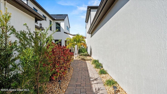 view of property exterior with stucco siding