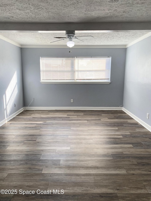 spare room with a healthy amount of sunlight and a textured ceiling