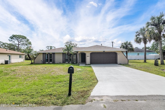 ranch-style house with a garage, central AC unit, and a front lawn