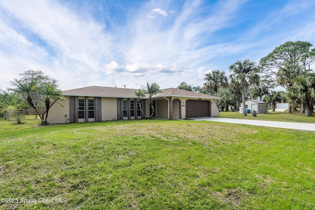 single story home featuring a garage and a front yard