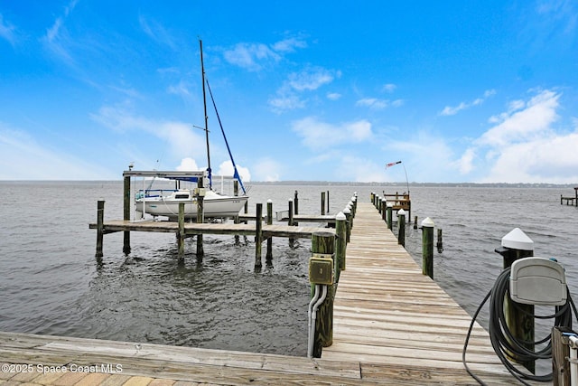 view of dock featuring a water view