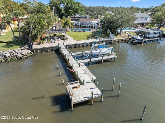 view of dock featuring a water view, a swimming pool, and glass enclosure