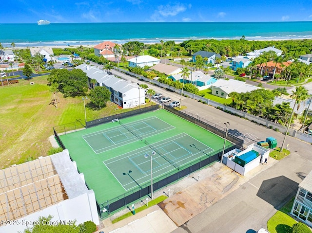 bird's eye view with a view of the beach and a water view