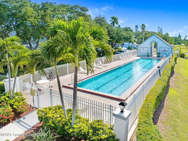 view of swimming pool with a patio area