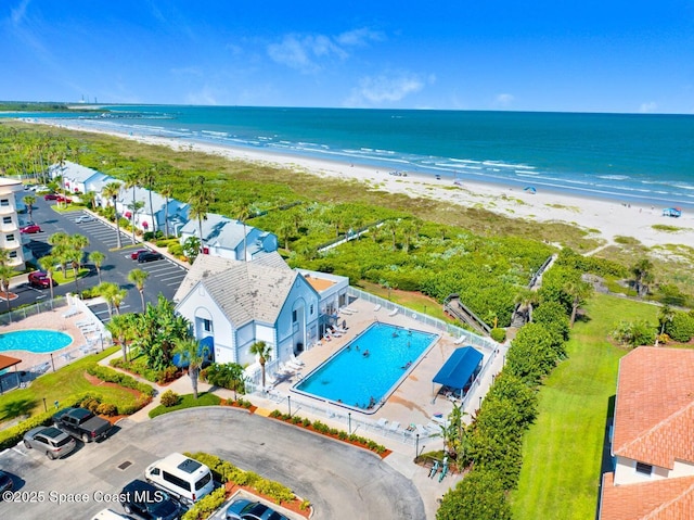 drone / aerial view with a view of the beach and a water view