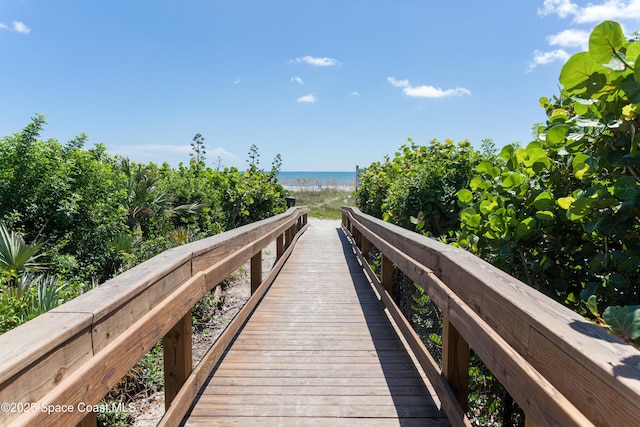 surrounding community featuring a water view