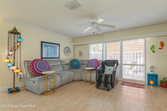 living room with crown molding and ceiling fan