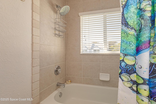 bathroom featuring shower / bath combo with shower curtain