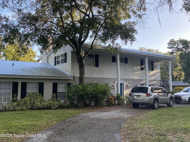 view of front of home with a front yard