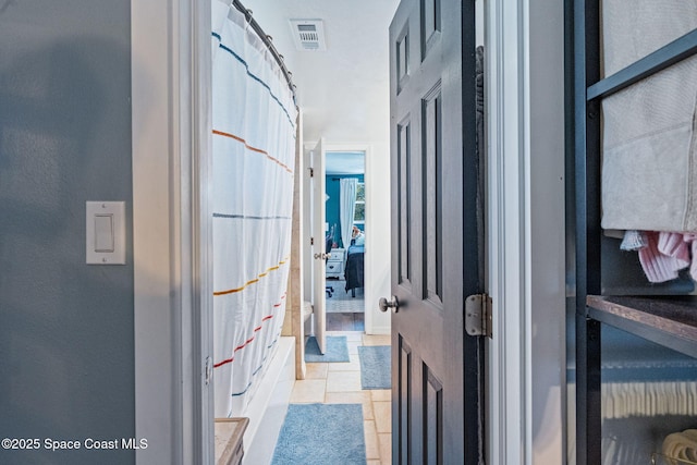 hallway with visible vents