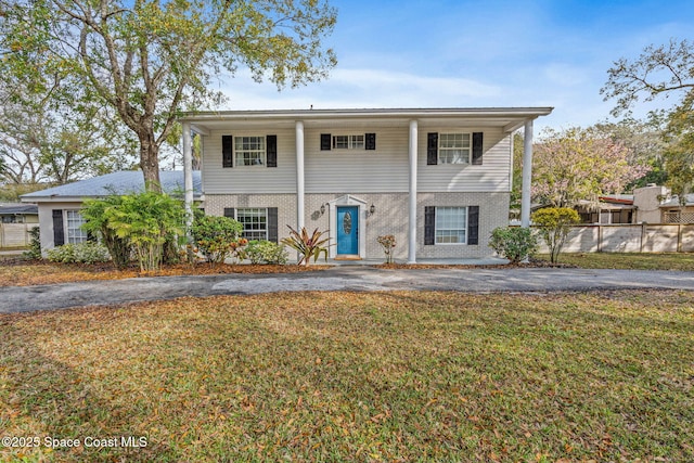 front of property featuring a front yard