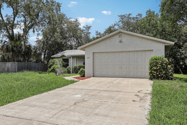 ranch-style home with a front lawn