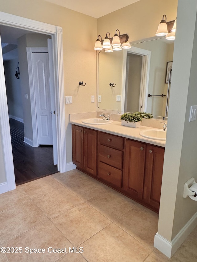 bathroom with vanity and tile patterned floors