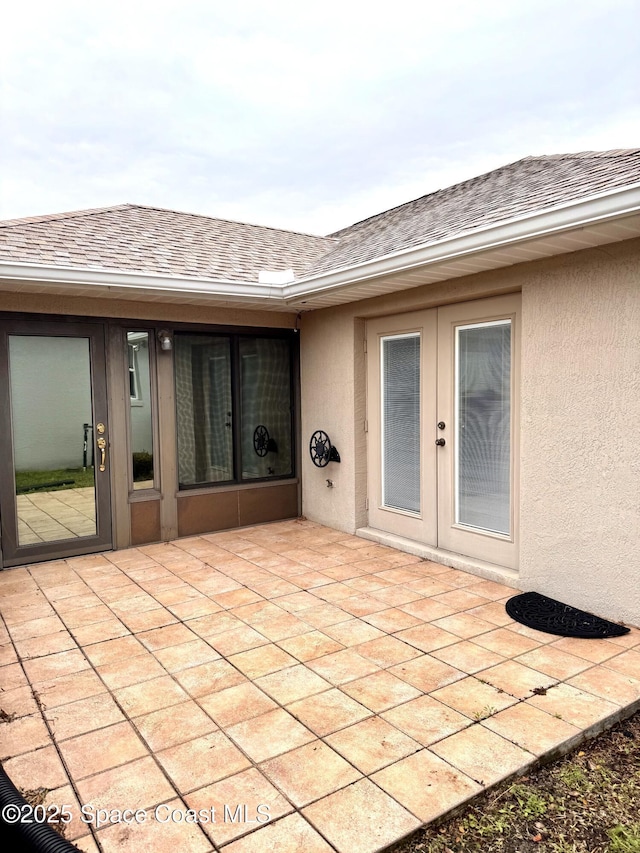 view of patio featuring french doors