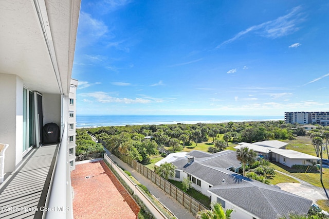 balcony featuring a water view