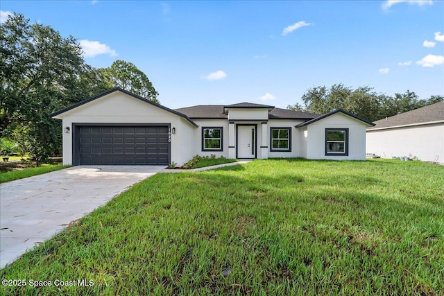 ranch-style home with a garage and a front lawn