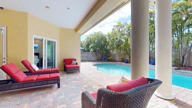 view of swimming pool with a patio