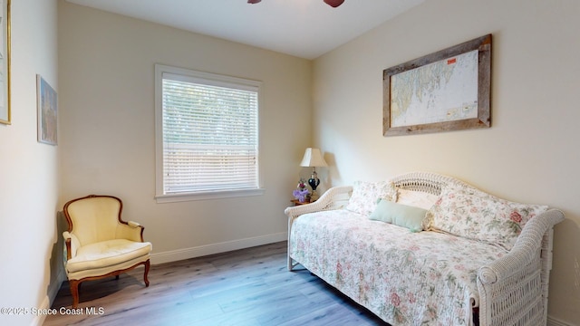 bedroom featuring wood-type flooring and ceiling fan