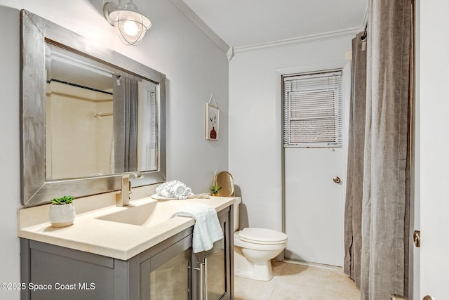 bathroom with tile patterned flooring, vanity, toilet, crown molding, and a shower with curtain