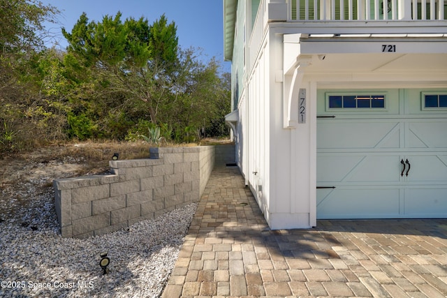 exterior space with a garage