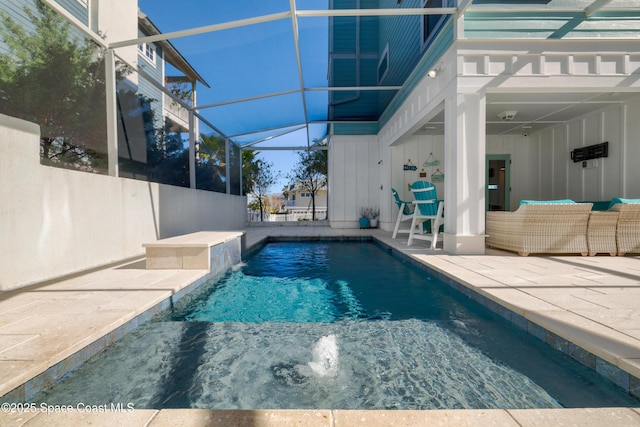 view of pool with an outdoor hangout area, a lanai, and a patio area