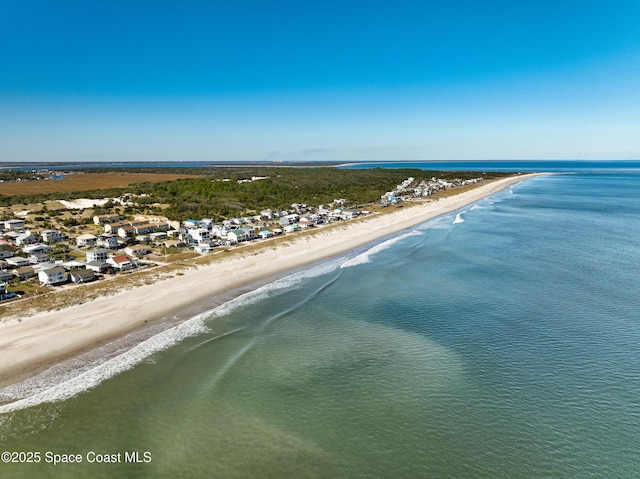 aerial view featuring a water view and a view of the beach