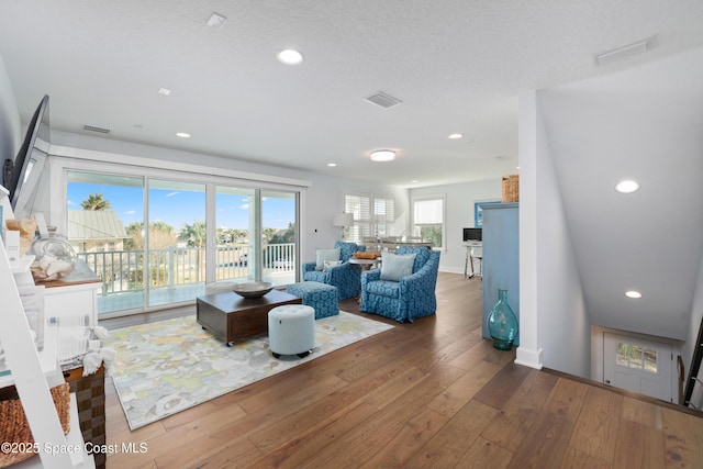 living room with hardwood / wood-style floors