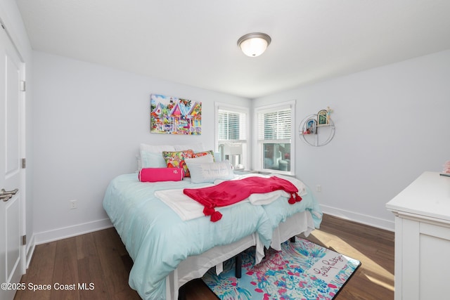 bedroom featuring dark wood-type flooring