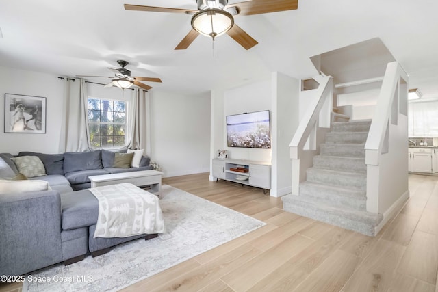 living room with light hardwood / wood-style floors