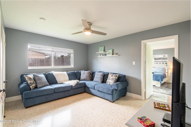 living room featuring ceiling fan