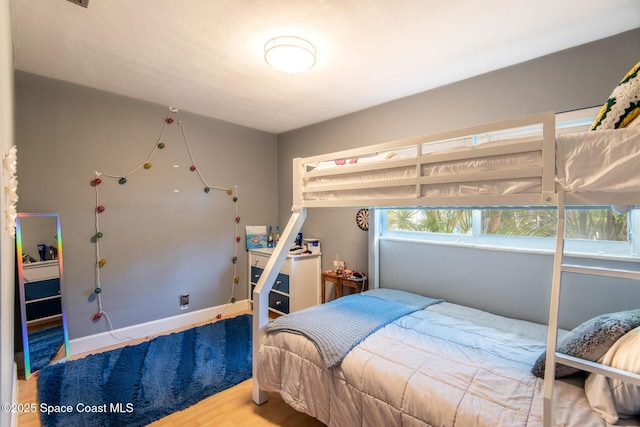 bedroom featuring hardwood / wood-style flooring