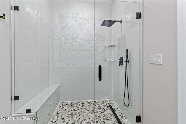 bathroom featuring tile patterned floors and walk in shower