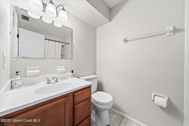 bathroom featuring tile patterned floors, toilet, an inviting chandelier, vanity, and curtained shower