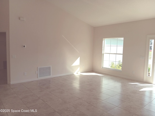 spare room with light tile patterned floors