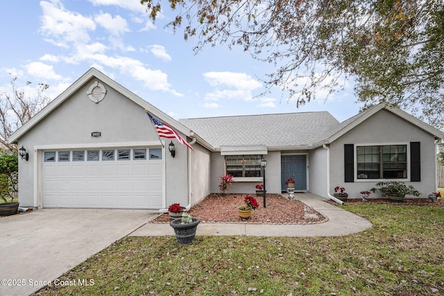 ranch-style home with a garage and a front yard