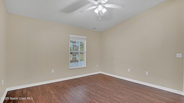 empty room featuring hardwood / wood-style flooring and ceiling fan